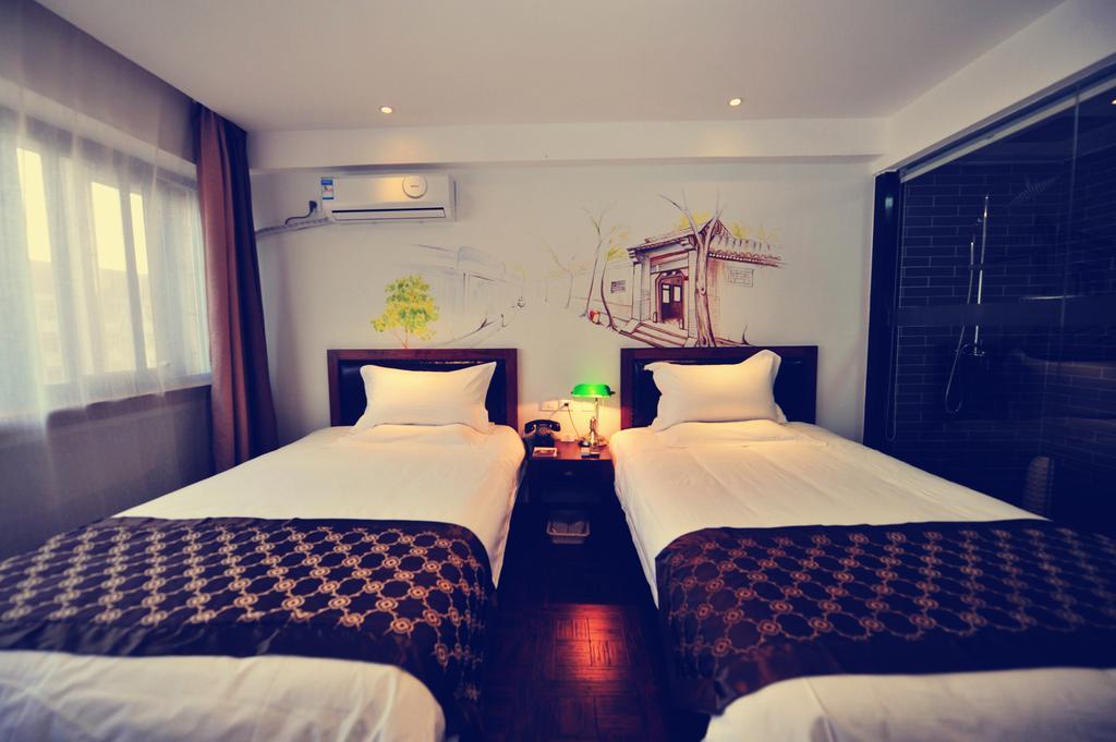 Nostalgiahotel-Tianjinguozhancenter Стая снимка
